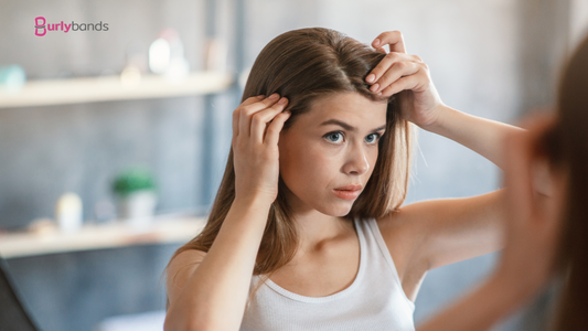 woman checking her scalp
