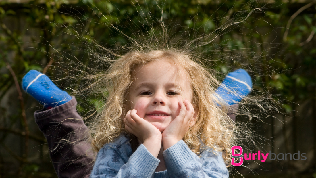 kid with frizzy static hair
