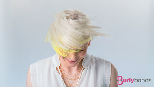 A lady with blonde hair and a streak of yellow