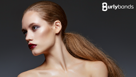 woman with hair tied in a ponytail