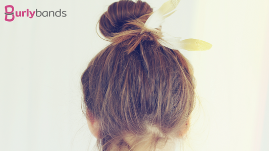 back of woman's hair in loose bun