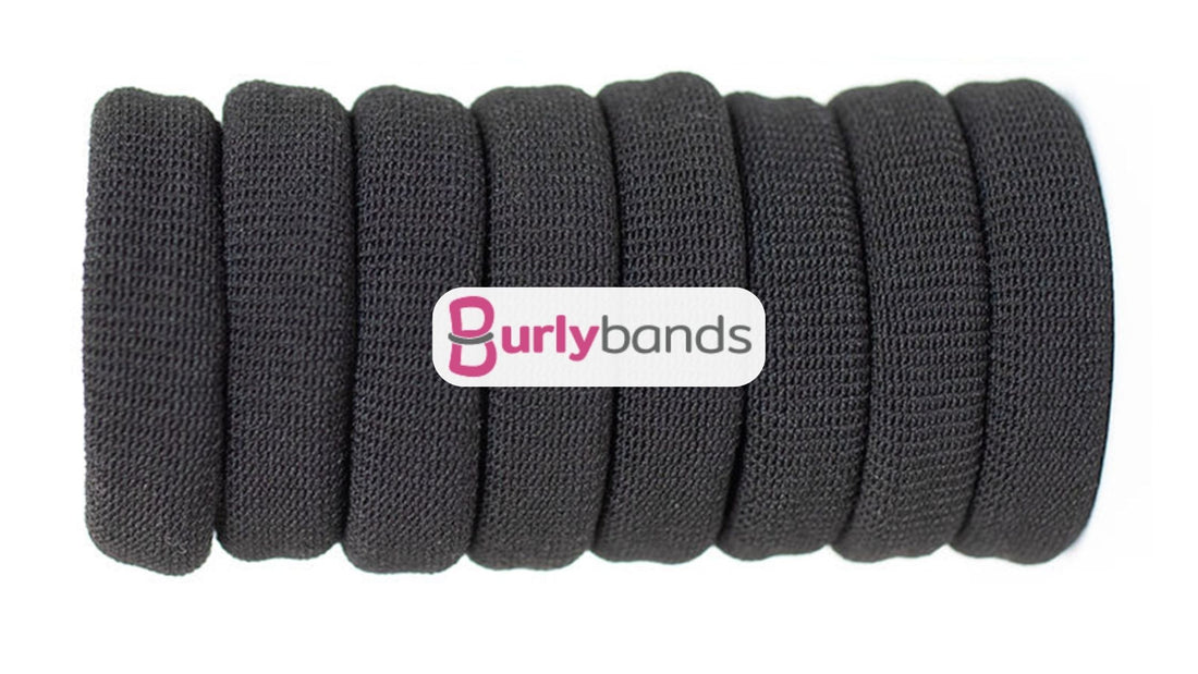 An eight pack of black Burlyband hairties