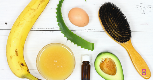 hair products on table hairbrush avocado banana oil